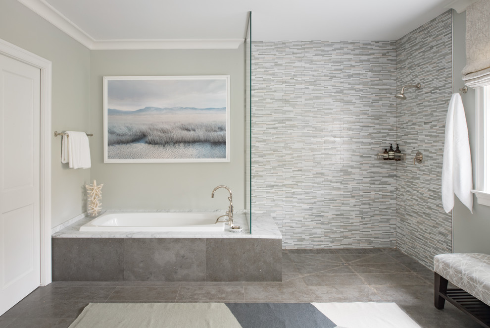 Large transitional master gray tile and matchstick tile gray floor and porcelain tile drop-in bathtub photo in DC Metro with gray walls, an undermount sink, marble countertops and white countertops