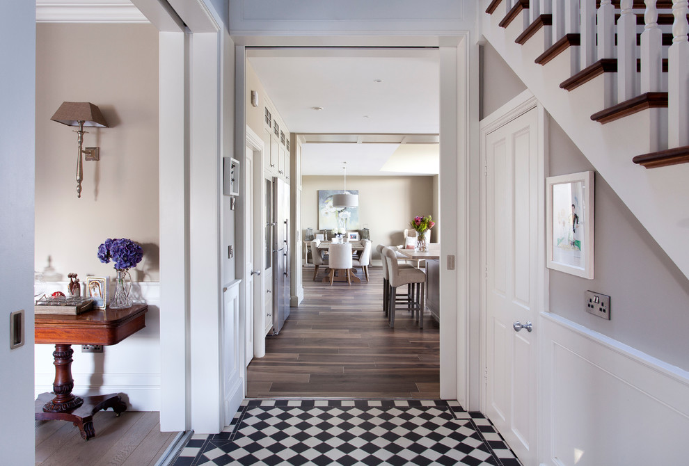 Design ideas for a large transitional hallway in Dublin with beige walls and porcelain floors.