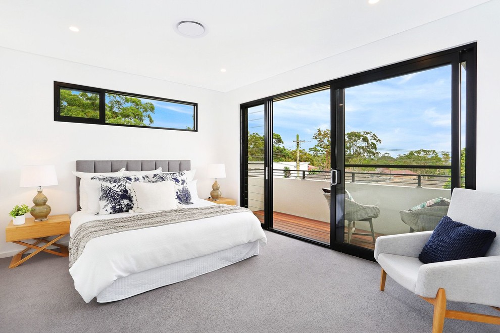 Design ideas for a transitional bedroom in Sydney with white walls, carpet and grey floor.