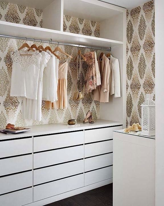 Photo of a mid-sized traditional women's walk-in wardrobe in Vancouver with open cabinets, white cabinets, dark hardwood floors and brown floor.