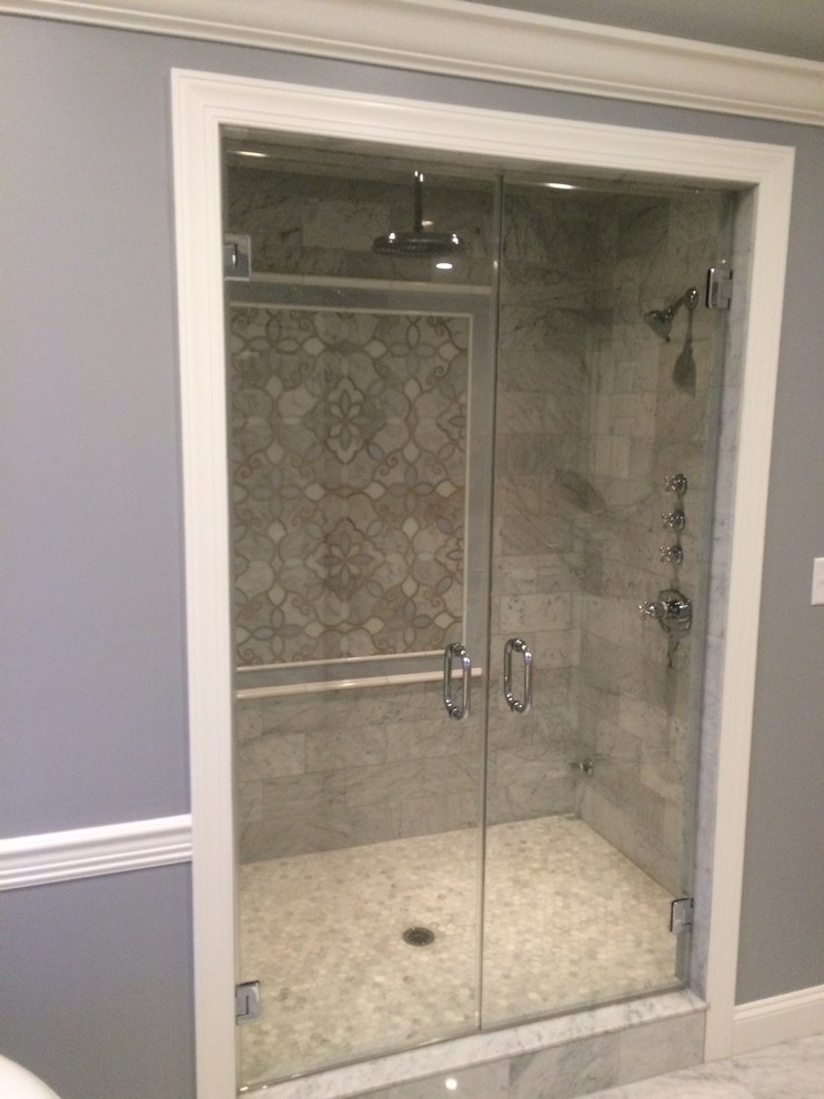 This is an example of a mid-sized modern master bathroom in New York with raised-panel cabinets, white cabinets, a freestanding tub, an alcove shower, grey walls, porcelain floors, an undermount sink, quartzite benchtops, white floor and a hinged shower door.