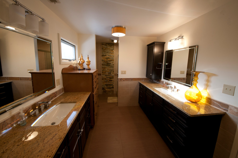 Alcove shower - large transitional master brown tile and ceramic tile ceramic tile alcove shower idea in Indianapolis with an undermount sink, recessed-panel cabinets, black cabinets, granite countertops, a two-piece toilet and beige walls