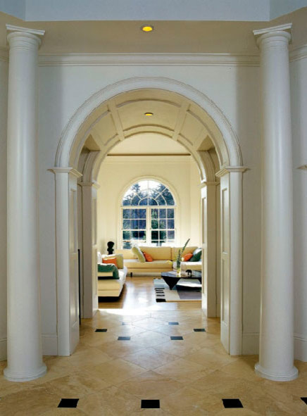 Entry hall - large transitional travertine floor entry hall idea in Boston with beige walls