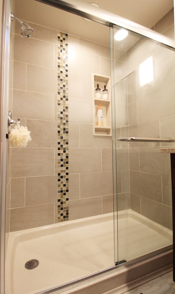 Design ideas for a mid-sized contemporary 3/4 bathroom in Seattle with flat-panel cabinets, dark wood cabinets, an alcove shower, a two-piece toilet, beige tile, black tile, blue tile, brown tile, mosaic tile, beige walls, ceramic floors, an undermount sink, laminate benchtops, grey floor and a sliding shower screen.