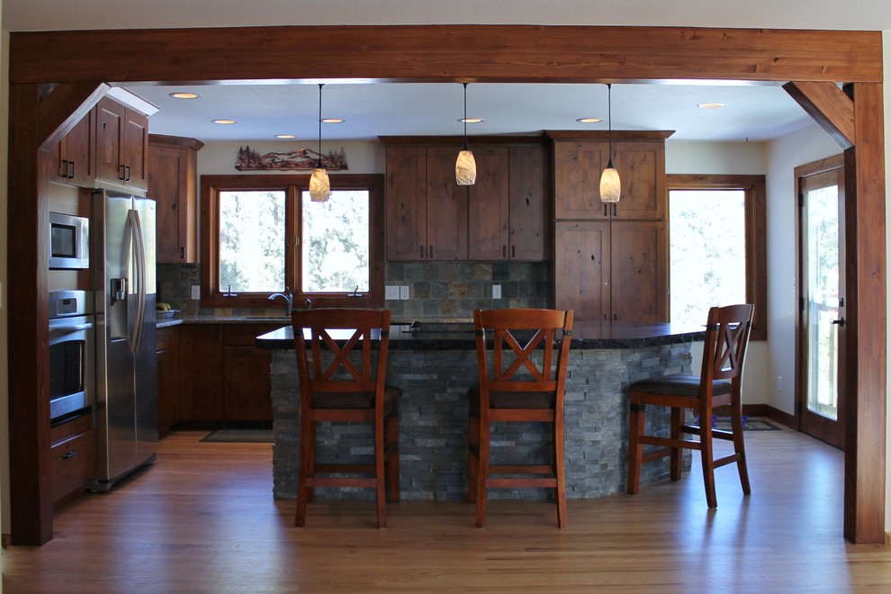 Mid-sized mountain style home design photo in Denver
