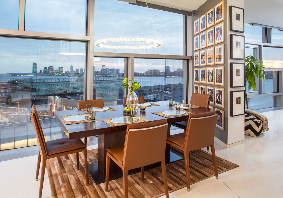 Contemporary open plan dining in New York with grey walls.