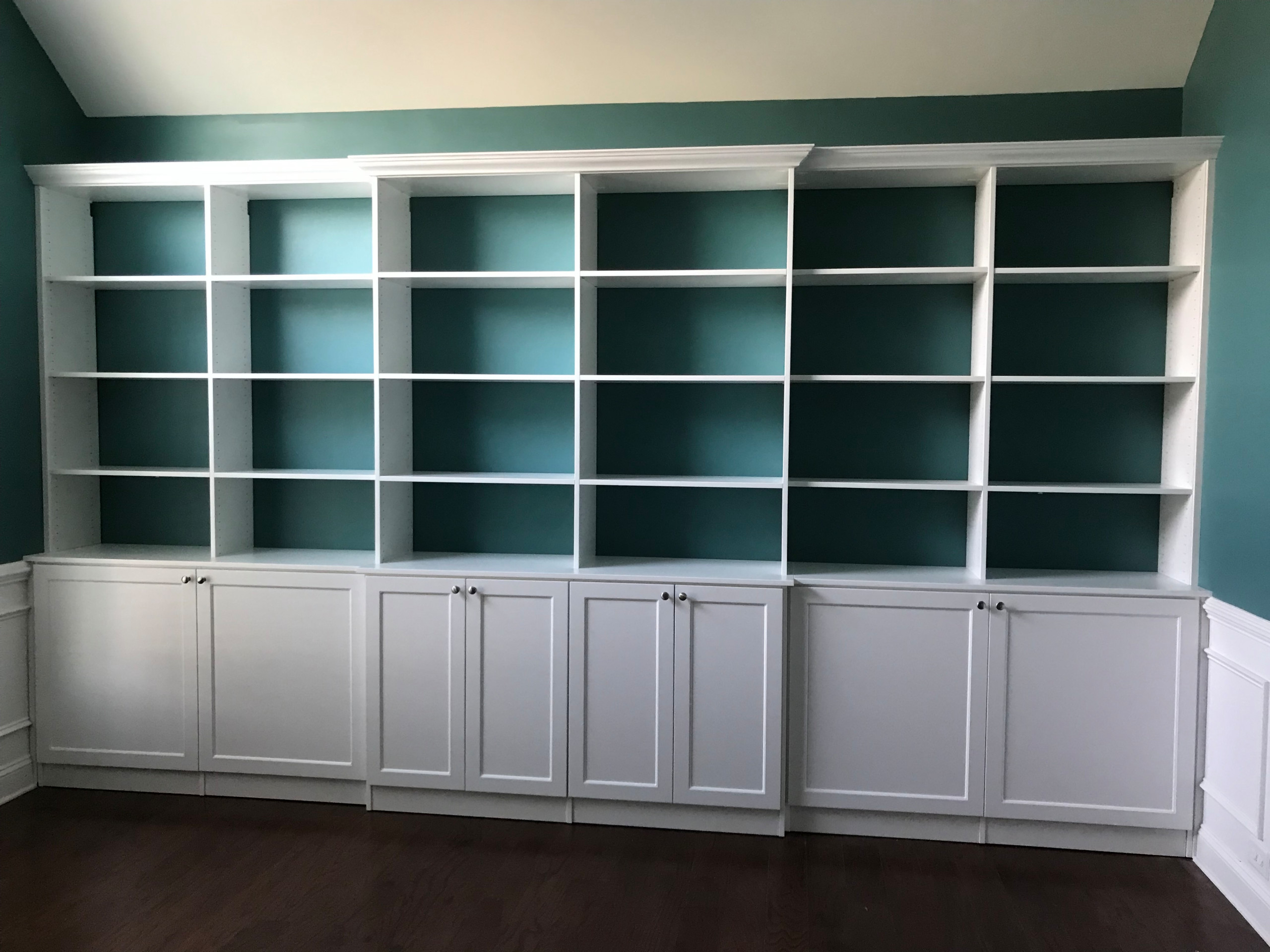 Built-in Shelving Unit with Cabinet Space and Crown Molding