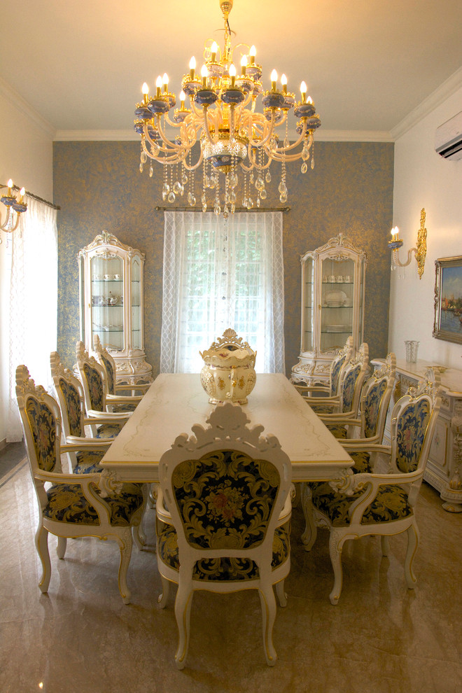 Design ideas for a contemporary dining room in Ahmedabad.