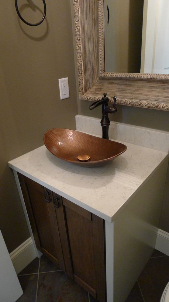 Country powder room in Other with shaker cabinets, medium wood cabinets and quartzite benchtops.