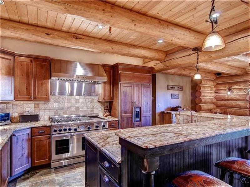 Mountain style kitchen photo in Denver