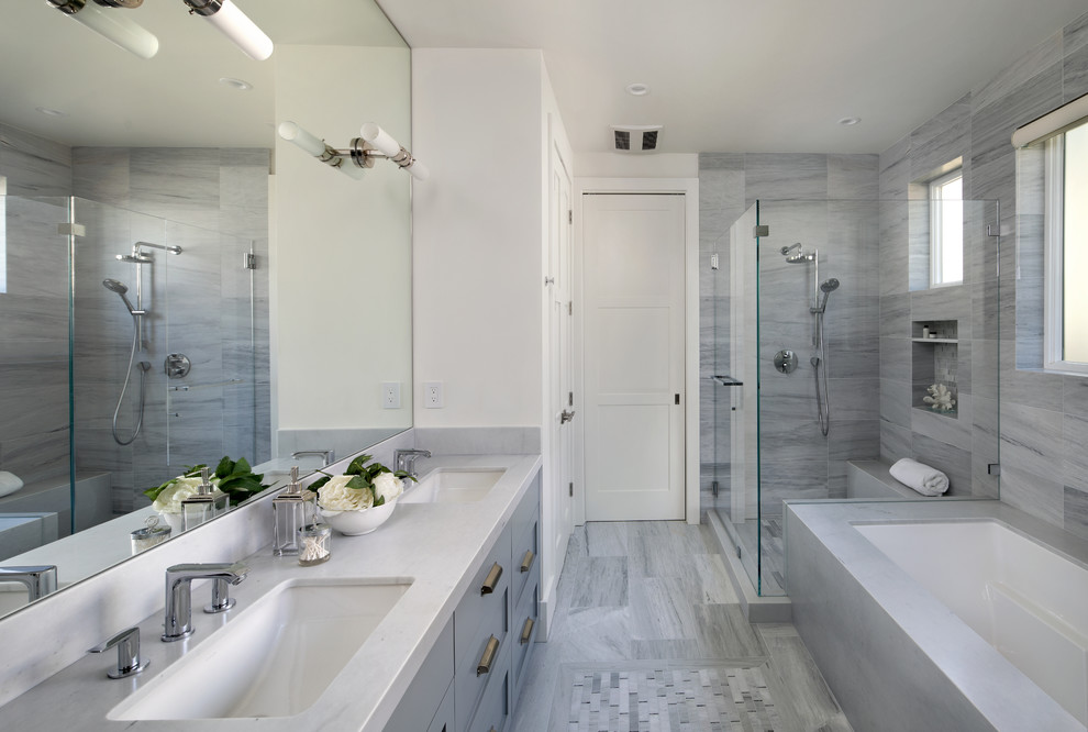 Inspiration for a large country master bathroom in San Francisco with shaker cabinets, grey cabinets, an undermount tub, gray tile, white walls, an undermount sink, grey floor, white benchtops, a corner shower, a two-piece toilet, porcelain floors, laminate benchtops and a hinged shower door.
