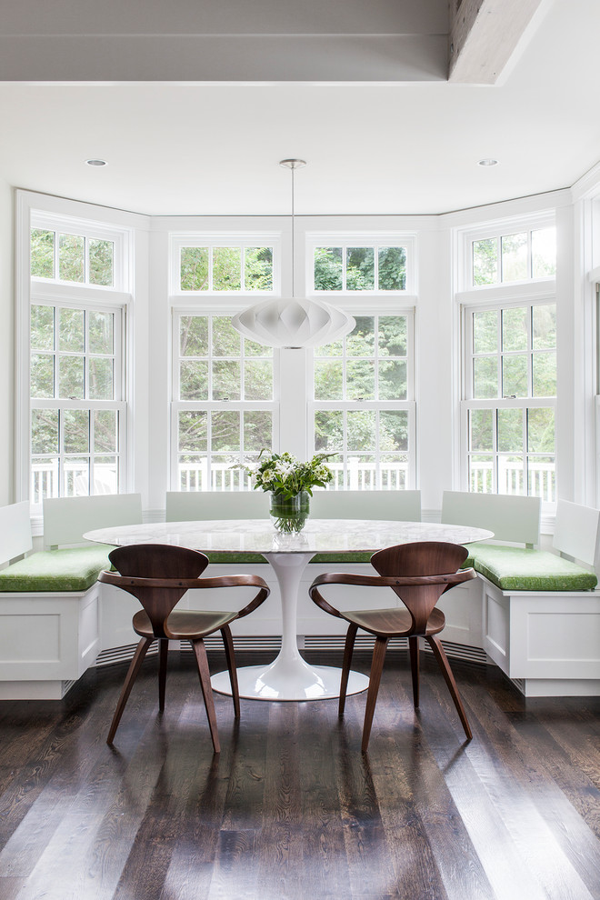 Design ideas for a small transitional dining room in Boston with dark hardwood floors.