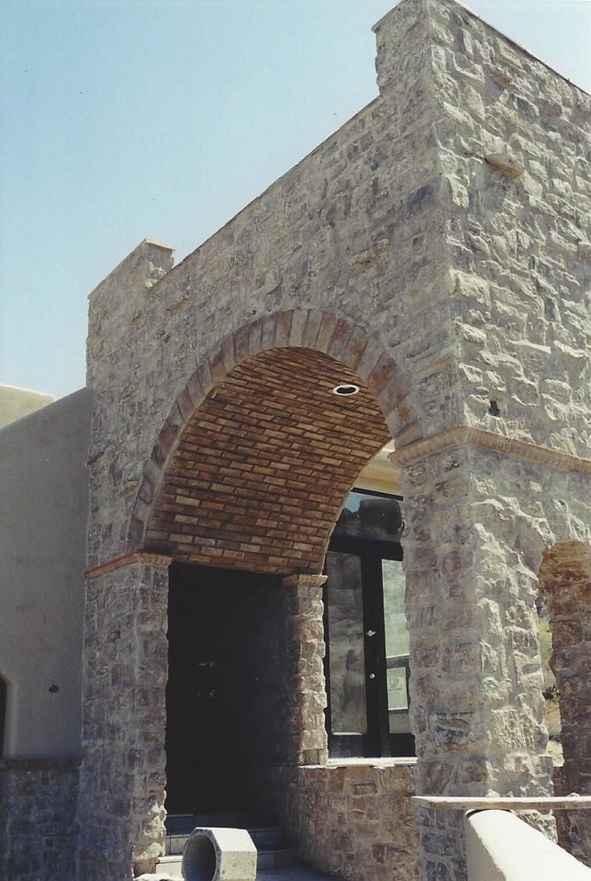 Inspiration for a rustic exterior home remodel in Phoenix