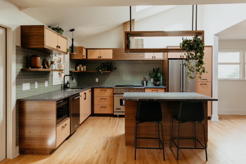 Inspiration for a midcentury kitchen in Nashville with with island.