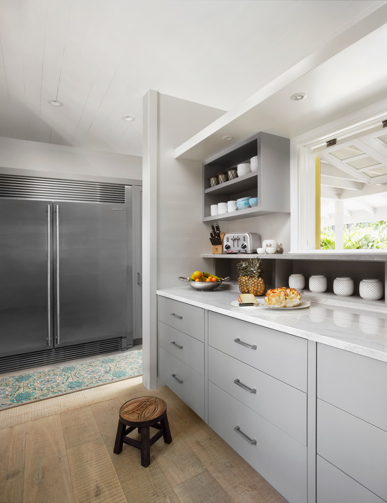 Beach style home design photo in Other