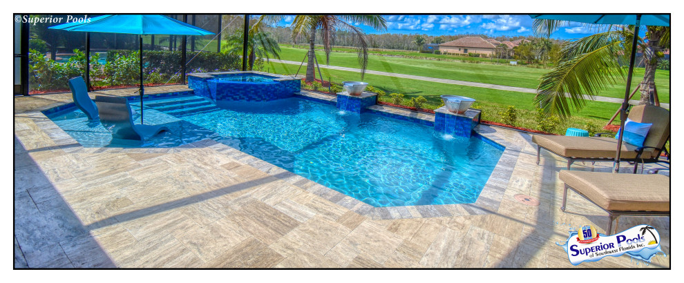 Photo of a mid-sized traditional backyard custom-shaped pool in Tampa with natural stone pavers.