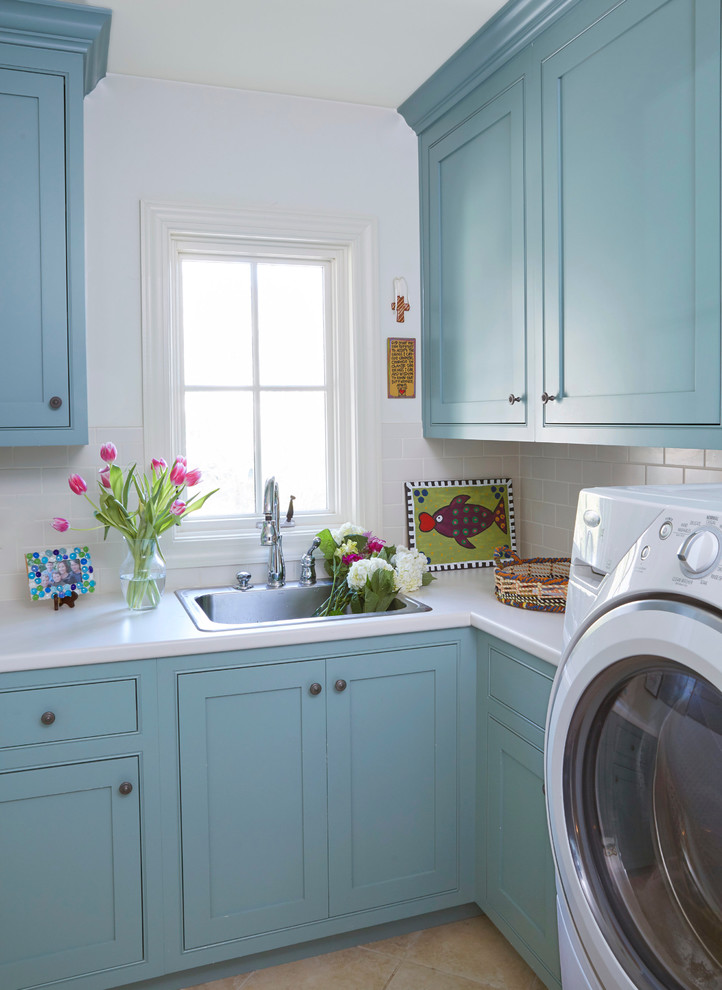 Inspiration for a contemporary laundry room in Birmingham with a drop-in sink, shaker cabinets, blue cabinets, ceramic floors, a side-by-side washer and dryer and white benchtop.