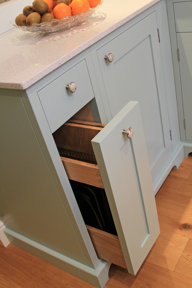 This is an example of a transitional kitchen in Hampshire.