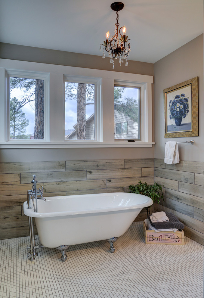 Design ideas for a country master bathroom in Albuquerque with a drop-in tub, a one-piece toilet, gray tile, porcelain tile, grey walls, ceramic floors and an undermount sink.