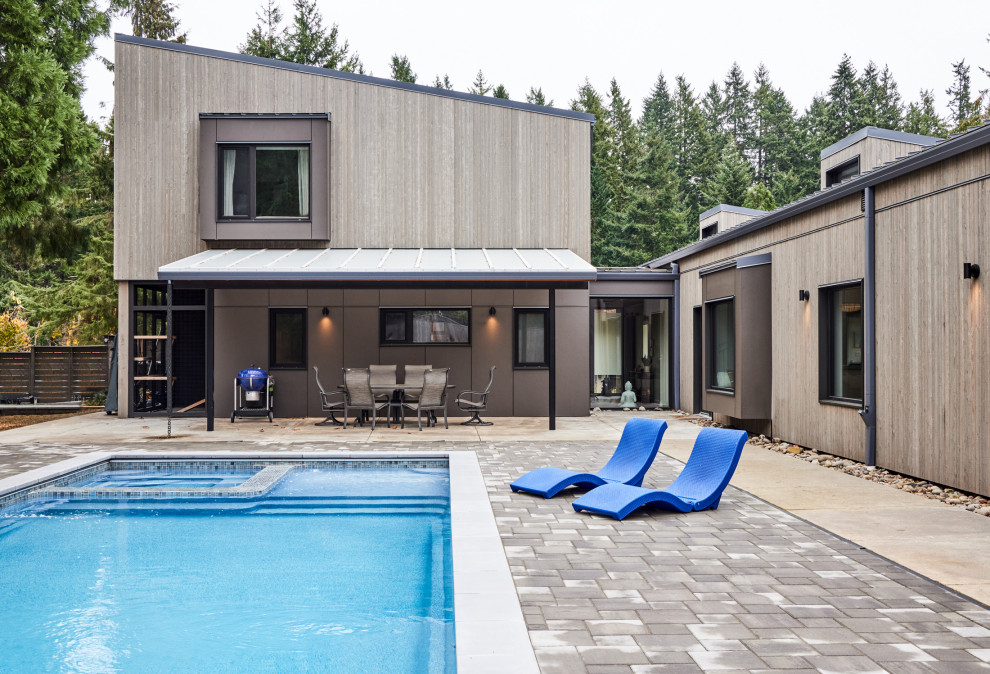 This is an example of a contemporary pool in Portland.