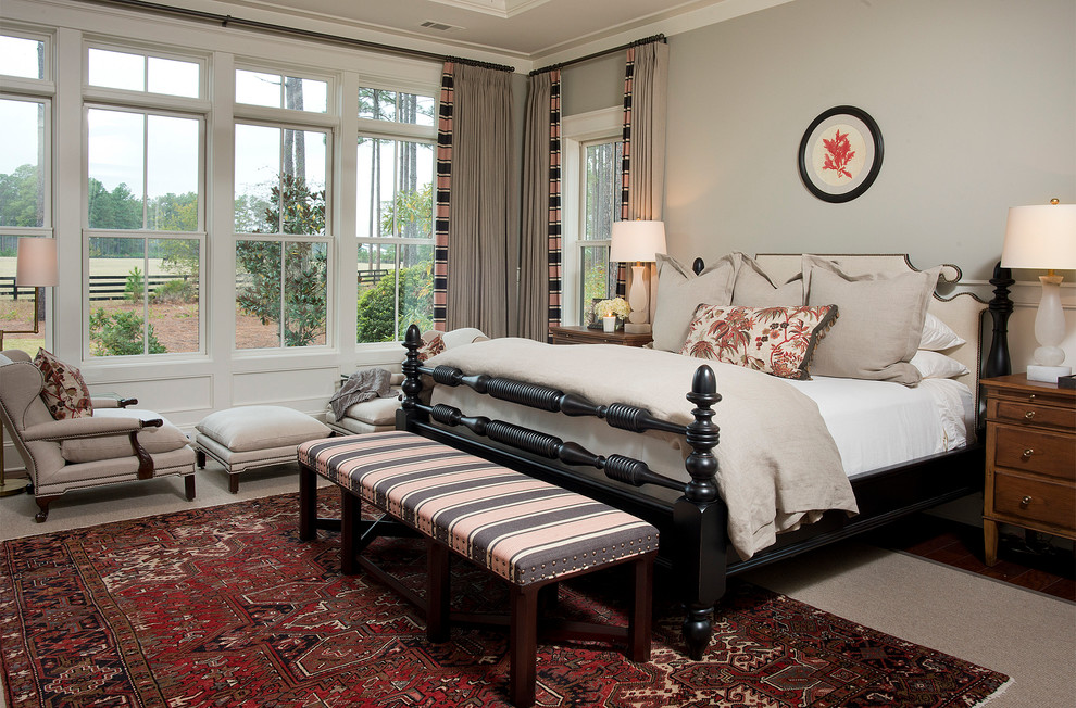 Inspiration for a traditional master bedroom in Atlanta with grey walls.