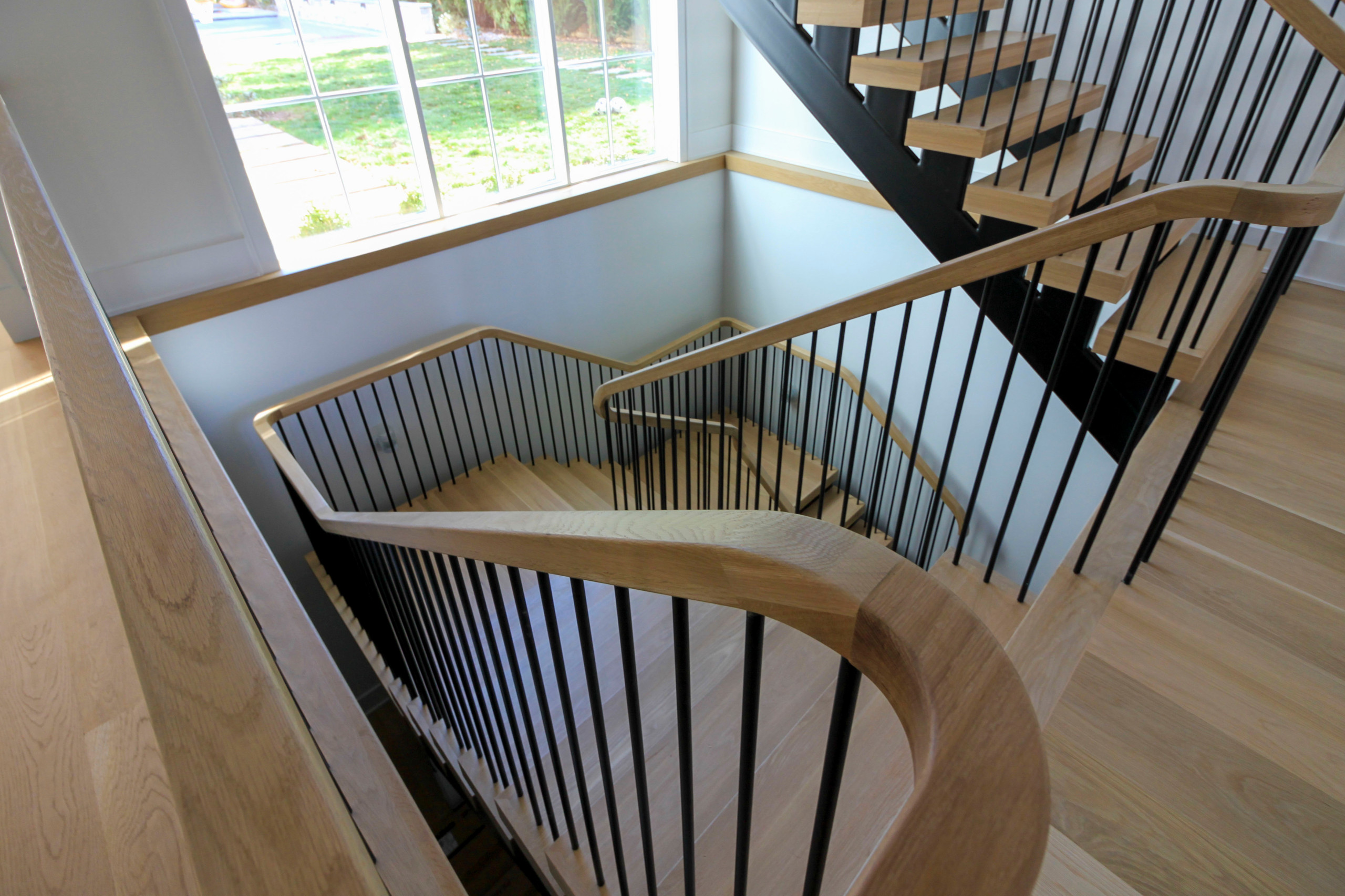 96_Dramatic cantilevered no-riser staircase, Bethesda, MD 20814