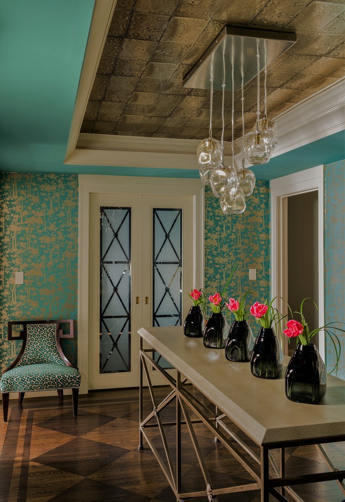 Example of a transitional dark wood floor foyer design in Boston with metallic walls