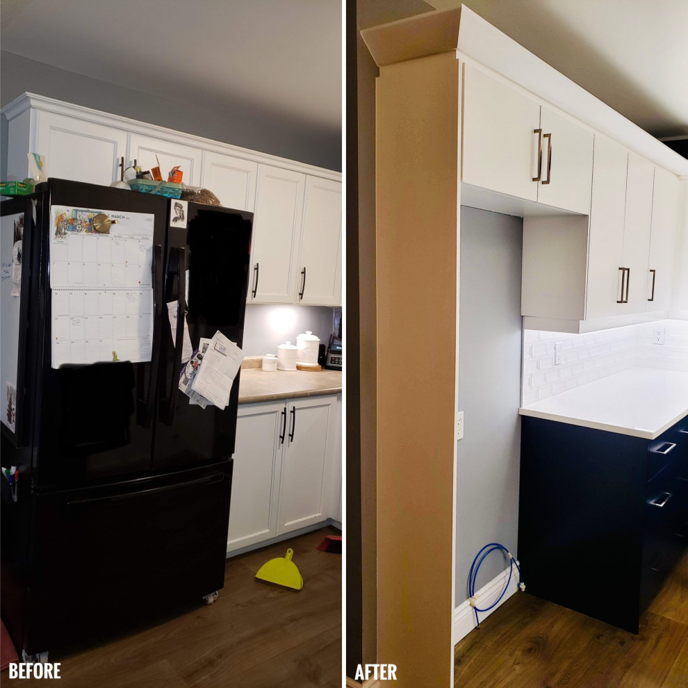 Transitional u-shaped open concept kitchen photo with an undermount sink, flat-panel cabinets, white cabinets, quartzite countertops, white backsplash, porcelain backsplash, no island and white countertops
