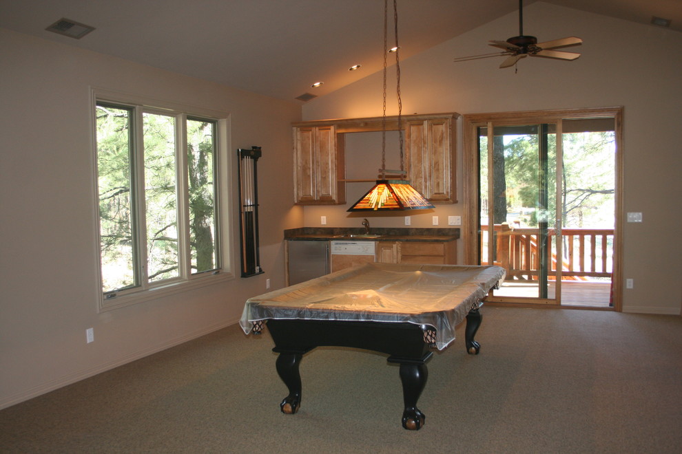 Inspiration for a country enclosed family room in Phoenix with a game room.