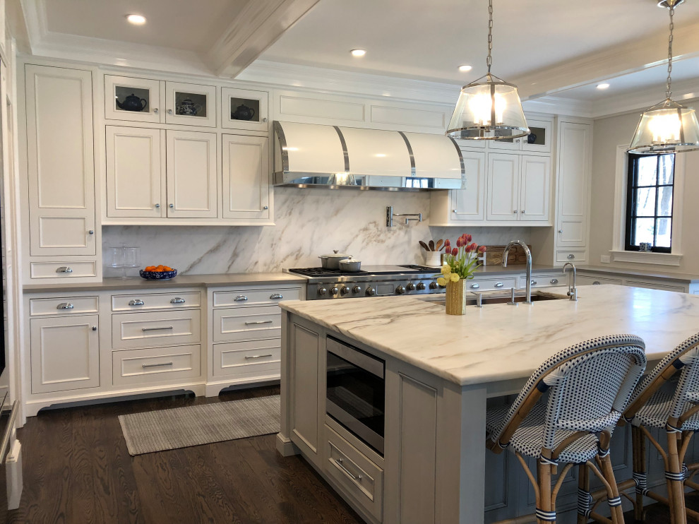 Inspiration for a transitional u-shaped eat-in kitchen in Newark with a single-bowl sink, beaded inset cabinets, white cabinets, marble benchtops, white splashback, marble splashback, stainless steel appliances, with island and white benchtop.
