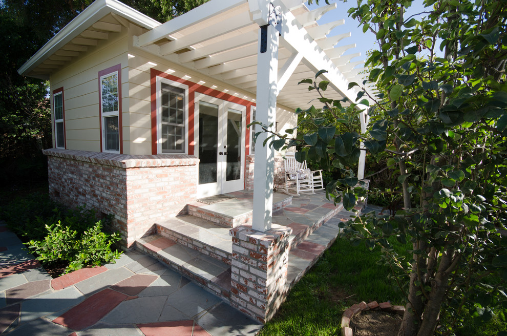 Photo of a traditional exterior in Los Angeles with wood siding.