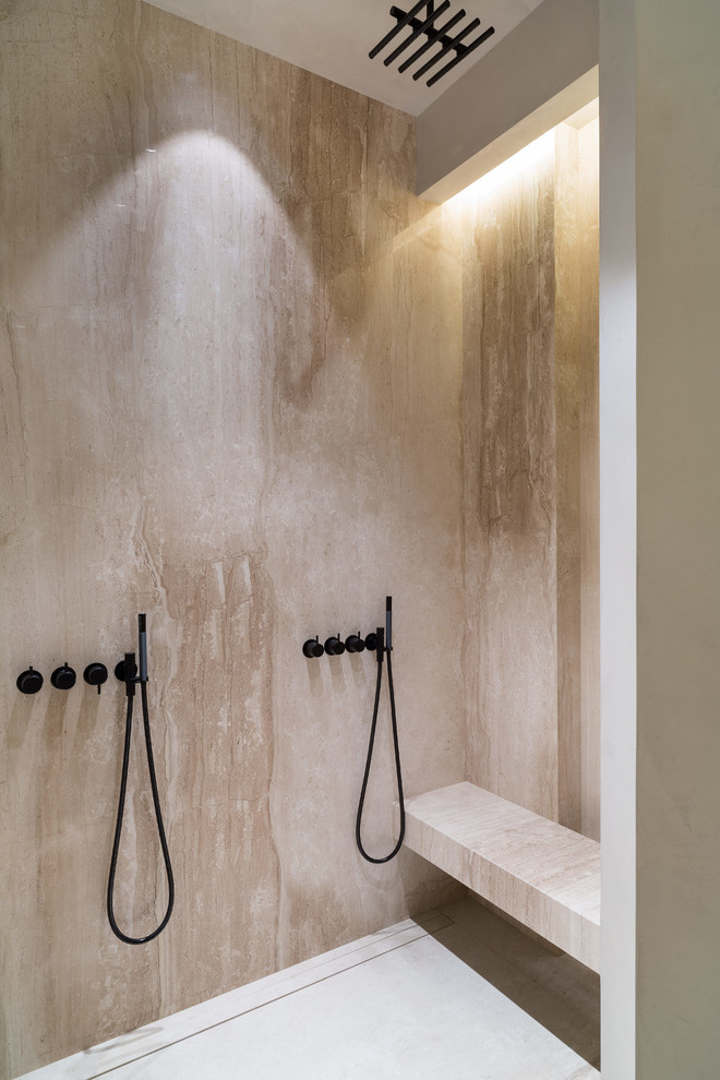 Inspiration for a mid-sized contemporary master wet room bathroom in Moscow with flat-panel cabinets, grey cabinets, a wall-mount toilet, marble, grey walls, marble floors, an integrated sink, concrete benchtops, a hinged shower door and grey benchtops.