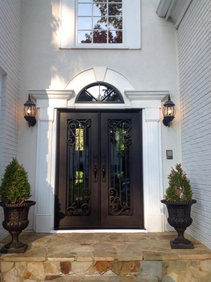 Inspiration for a large transitional front door remodel in Atlanta with a black front door