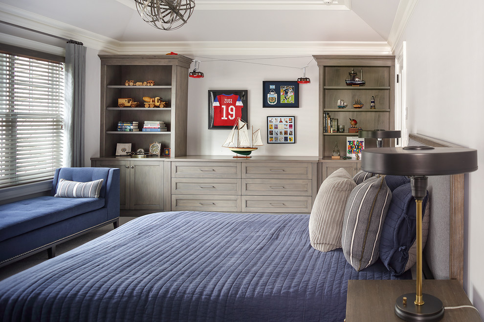 Boy's Bedroom with Blue and Grey - A teenage boy's bedroom with blue upholstery and grey built in cabinetry.

Peter Rymwid Photography