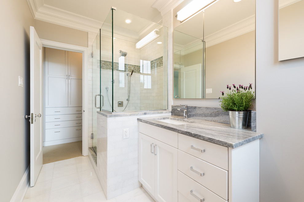 Inspiration for a mid-sized transitional 3/4 green tile and mosaic tile ceramic tile and white floor corner shower remodel in Chicago with flat-panel cabinets, dark wood cabinets, gray walls, an undermount sink and granite countertops