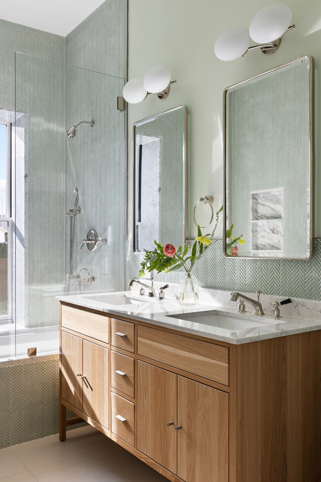 Inspiration for a transitional green tile bathroom remodel in New York with green walls