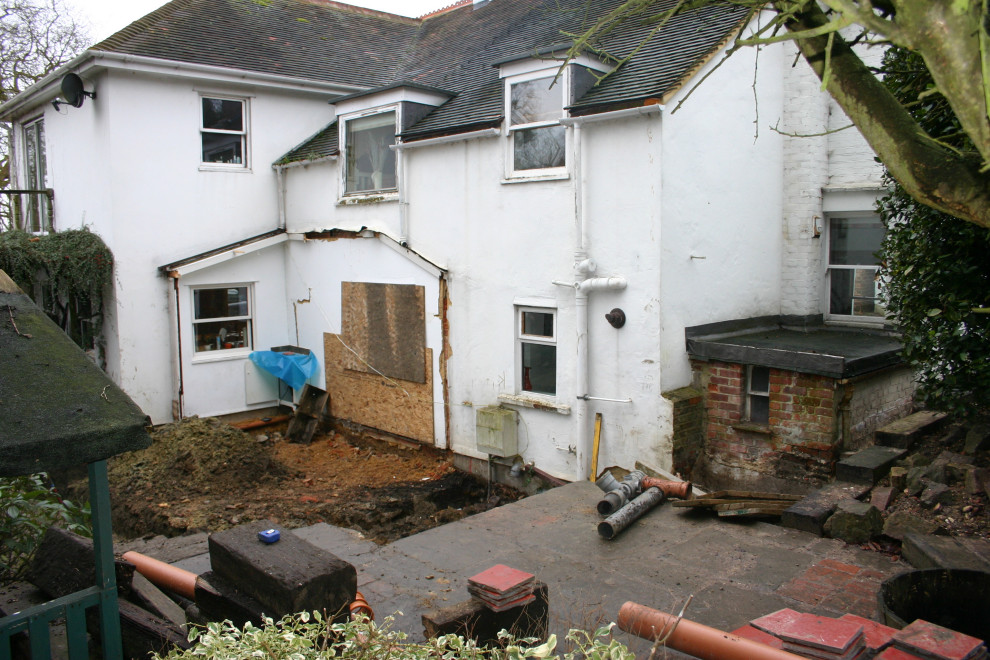 Pinkneys Green ,clearing the site and digging footings, notice the damp outhouse