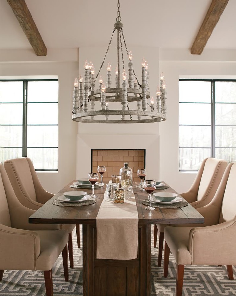 Example of a transitional light wood floor and beige floor enclosed dining room design with white walls