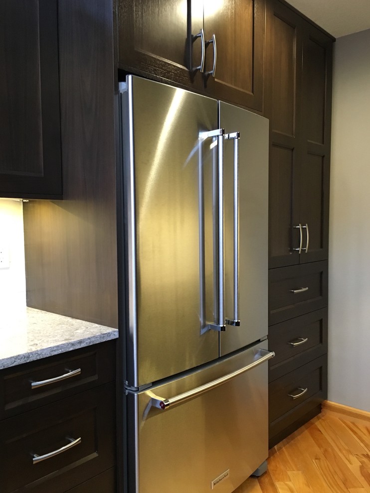 Transitional home design photo in Calgary