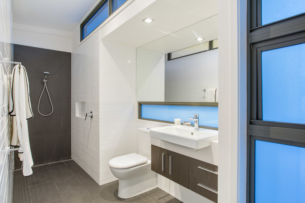 Contemporary bathroom in Brisbane with flat-panel cabinets, an open shower, white tile, subway tile and an open shower.