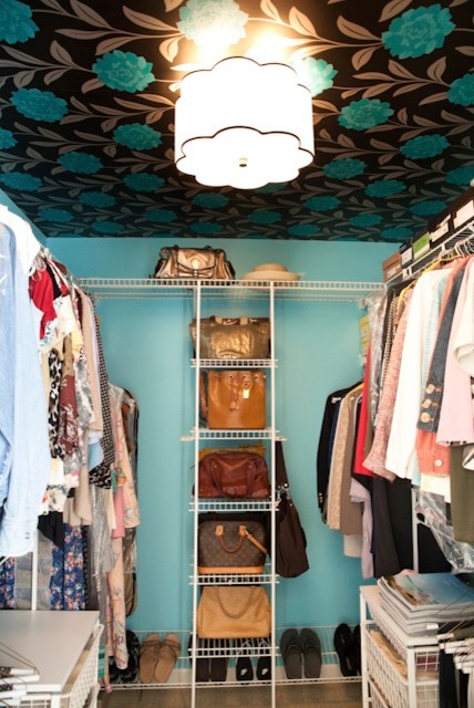 Example of a small transitional women's carpeted walk-in closet design in Charlotte