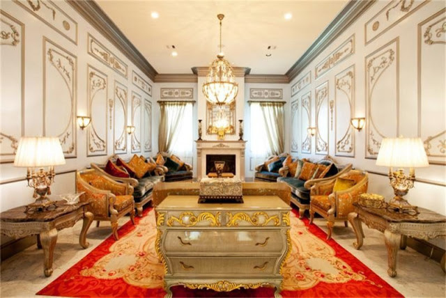 This is an example of a large traditional formal enclosed living room in Other with a concealed tv.