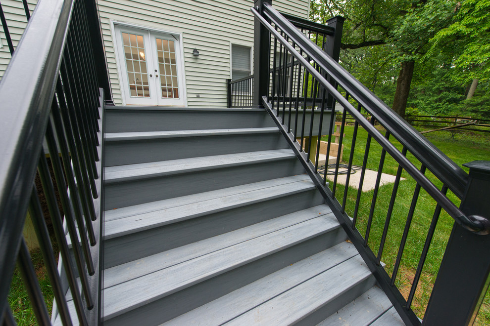 Inspiration for a mid-sized backyard deck remodel in Baltimore with no cover