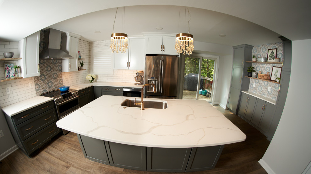Design ideas for a small transitional u-shaped open plan kitchen in Baltimore with an undermount sink, shaker cabinets, grey cabinets, quartz benchtops, white splashback, porcelain splashback, stainless steel appliances, vinyl floors, with island and white benchtop.