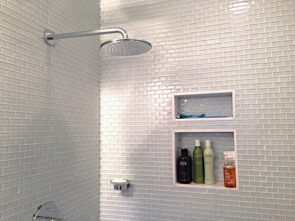 Design ideas for a modern bathroom in Other with a corner shower, white tile and glass tile.