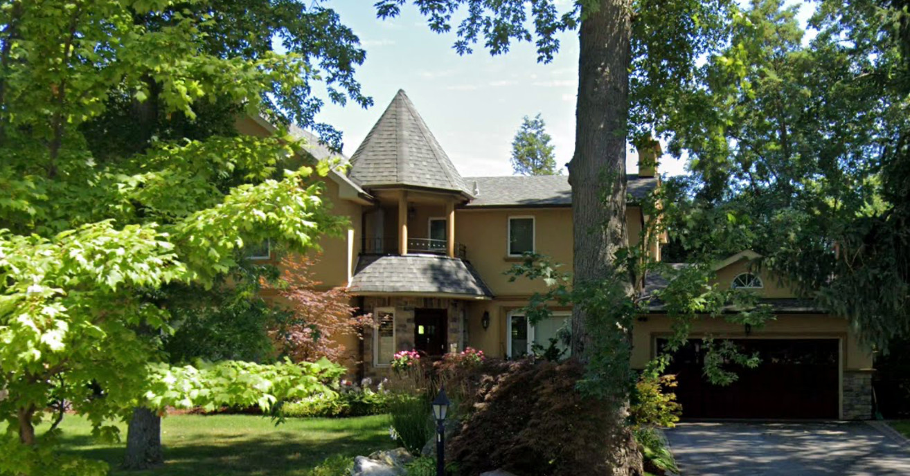 Entry with balcony above