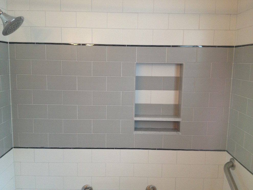 Inspiration for a mid-sized kids' drop-in bathtub remodel with beige walls