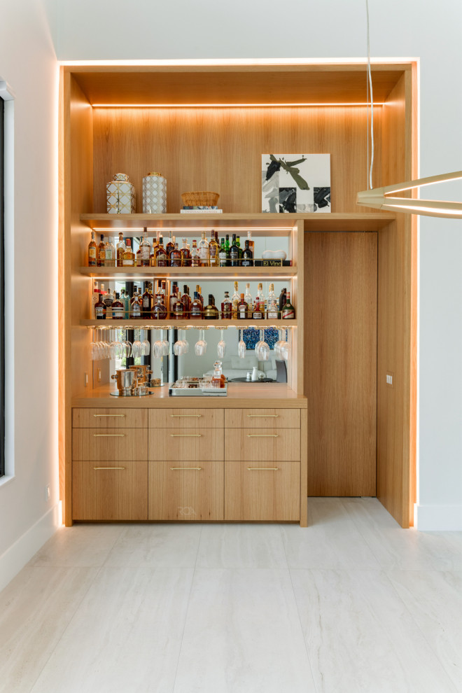 Scandinavian single-wall home bar in Miami with flat-panel cabinets.
