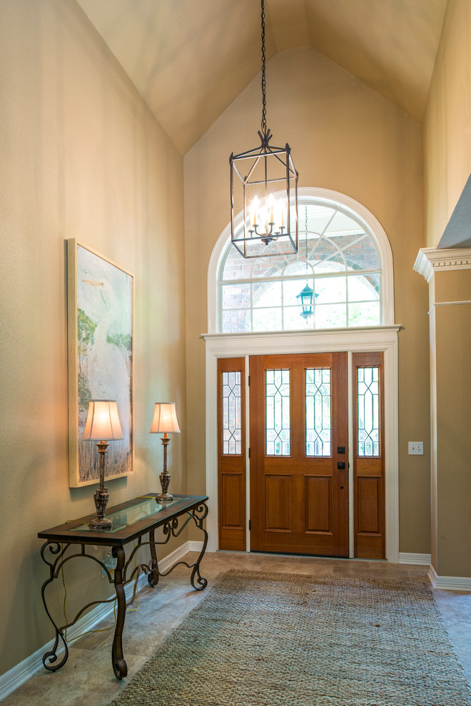 Example of a transitional home design design in Austin