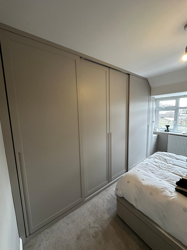 Sliding door wardrobe sprayed in farrow and ball elephants breath with oak int